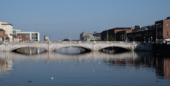 Urban cityscape of cork city river lee and Saint particks bridge. Ireland europe.