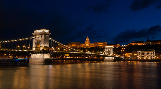 Royal Palace or the Buda Castle and the Chain Bridge after sunset. Budapest Hungary Europe.