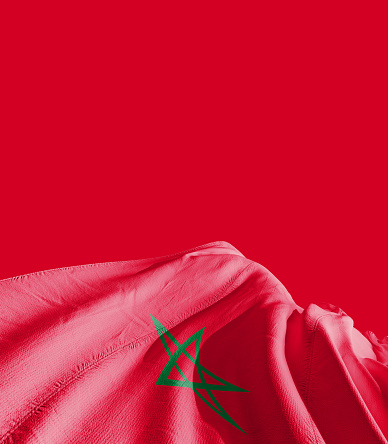 Morocco flag waving in red background.