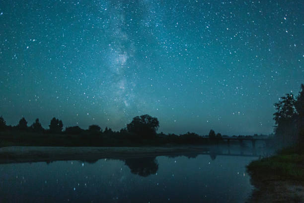 Free Stock Photo of Night Sky Reflecting on Water Surrounded by Trees ...