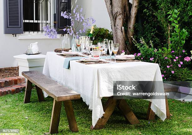 Farmstyle Rustic Table Setting Stock Photo - Download Image Now - Tablecloth, Table, Yard - Grounds