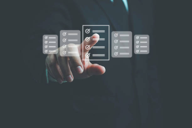 istock Business performance checklist, Quick checklist and clipboard management concept, job applicants, businessman using laptop doing online checklist survey,Employees must complete the online survey form. 1671797071