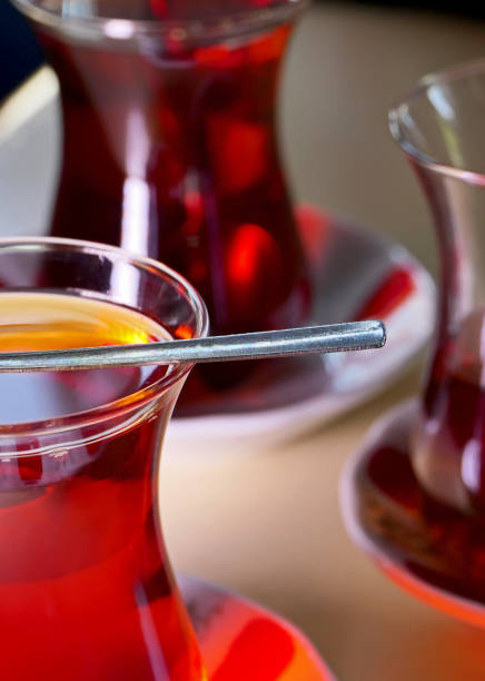 istock glass of Turkish tea with spoon on table 1671797553