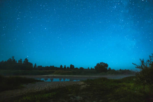 istock Night starry sky. Stars background. Milky Way galaxy 1671798921