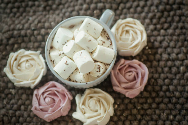 Young woman is enjoying a cup of hot chocolate