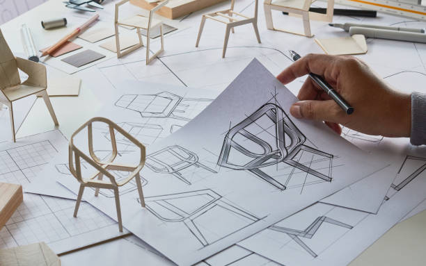 istock Designer sketching drawing design development product plan draft chair armchair Wingback Interior furniture prototype manufacturing production. designer studio concept . 1671856059