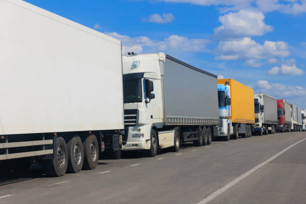istock Trucks on road in a traffic jam 1671865922