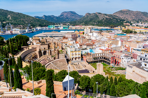 The city of Cartagena in the Region of Murcia, Spain.  The Roman ruins of Carthago Nova are in the foreground.