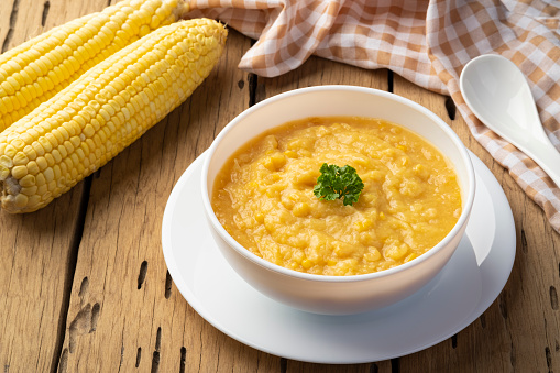 Creamy corn Pottage soup on white bowl,healthy food style