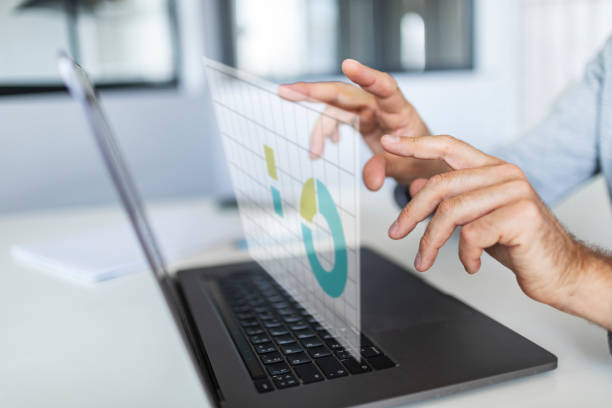 istock Businessman working on digital screen virtual hologram of statistics, graph and chart 1671898241