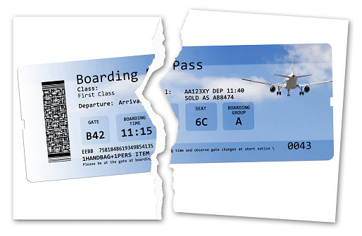 Flight cancelled concept with ripped flight ticket - concept image