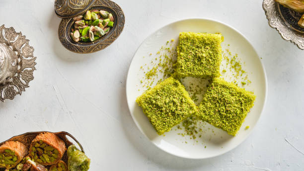 istock Turkish sweets with pistachio - baklava 1672022625