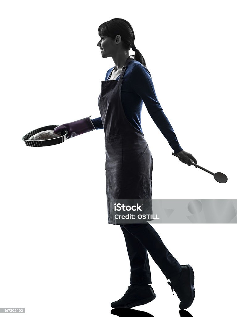 Mulher caminhando de cozinha silhueta Bolo doce - Foto de stock de Mulheres royalty-free