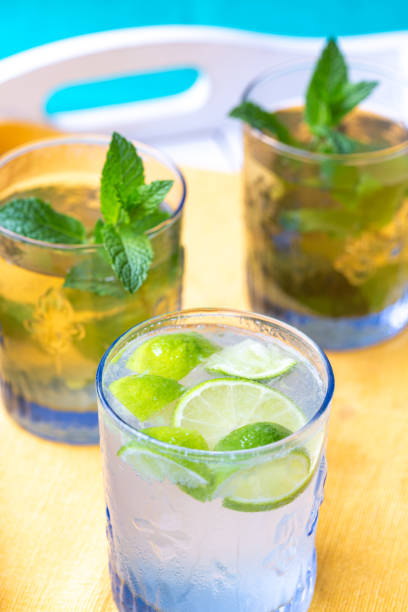 istock mojito cocktail with lime and mint 1672025289