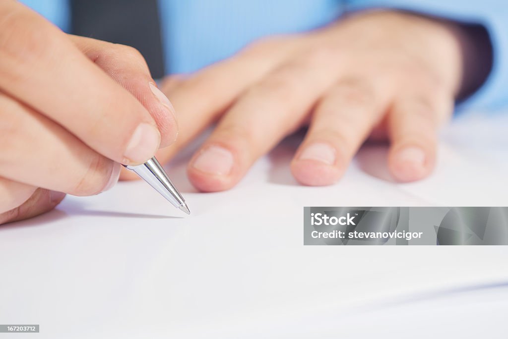 Empresário Escrevendo uma nota - Foto de stock de Acordo royalty-free