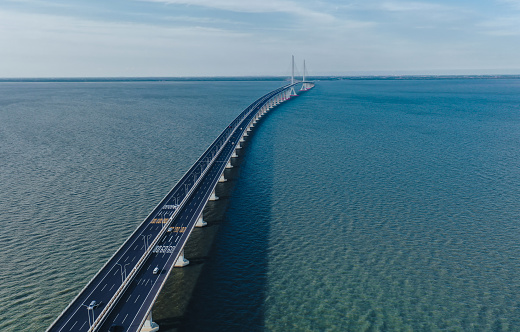 A bird's eye view of the blue sea and sea-crossing bridges