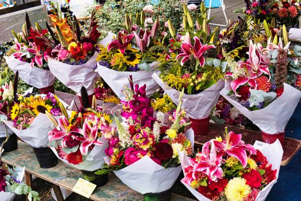 istock Bouquets on a farmer's market stand. 1672038356