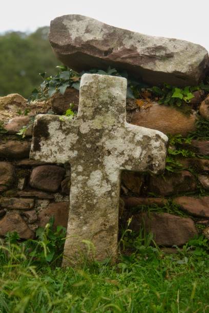 istock Stone Cross in an Irish Cemetery. 1672042697