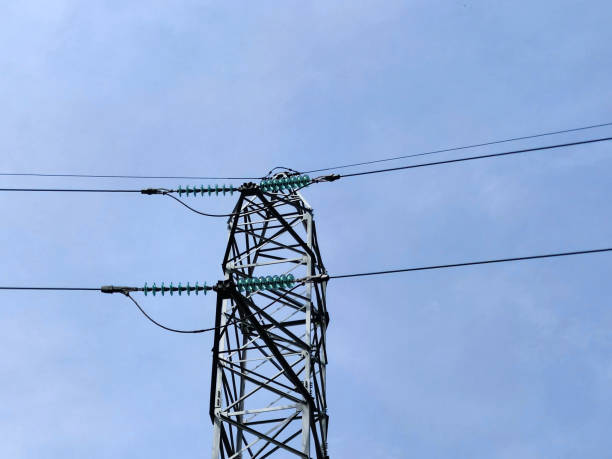istock high voltage power line tower against a clear blue sky 1672043848