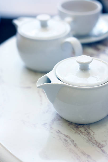 istock Closeup image of teapots on a table in cafe 167204855