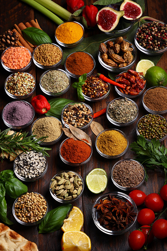 Herbs and Spices with various ground culinary powders