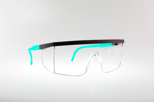 Pair of safety goggles on a background