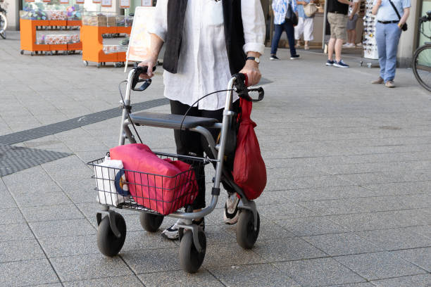 istock Woman mid-60s with a walker 1672074681