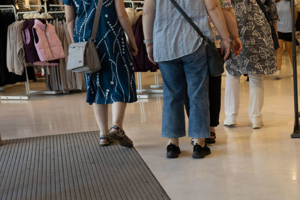 istock Some old women in a clothes store 1672074719