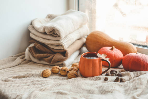 istock Cup of hot tea and a leaf, autumn mood 1672093336