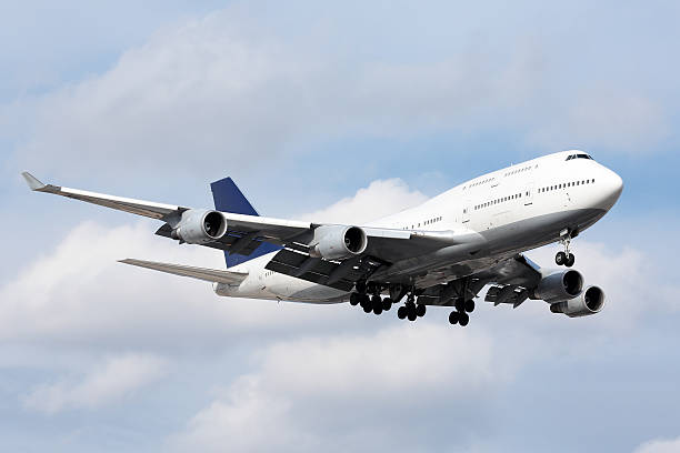 istock Large passenger aircraft on approach for landing 167211025
