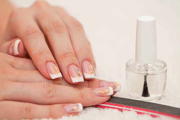 istock Female hands and manicure related objects in spa salon 167211244