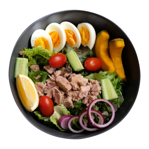 istock Tuna salad with eggs, tomatoes, pumpkins, lettuce, cucumber and 1672149291