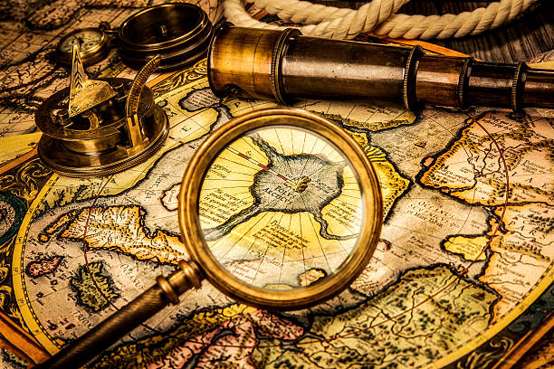 istock Vintage magnifying glass lies on the ancient map North Pole. 167220416