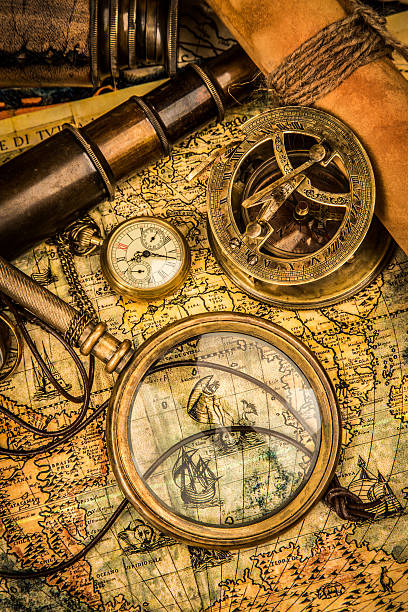 istock Vintage magnifying glass lies on an ancient world map 167220554