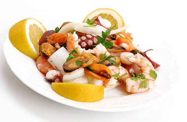 seafood salad seafood salad on white background seafood salad stock pictures, royalty-free photos & images