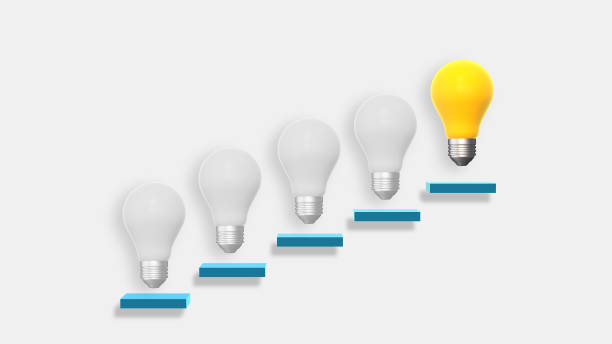 istock Climbing steps towards a light bulb concept of success growth and development 1672261570