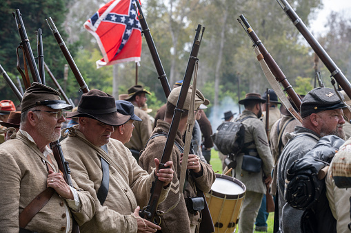 Huntington Beach, CA, USA - September 2, 2023: Confederate troops lined up ready for battle during a  civil war reenactment at the Huntington Beach Historical Society 30th annual Civil War Days Living History Event in Huntington Beach Central Park.
