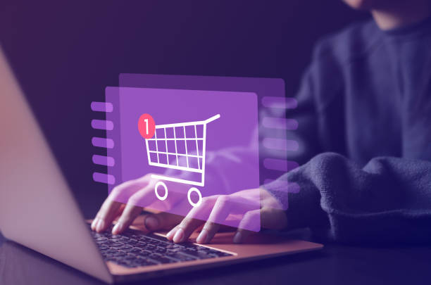 istock Online shopping and e-commerce technology internet concept. Woman or Shopper using a laptop computer with shopping cart icon, shopping service on the online web, Buy in online shop, 1672292685