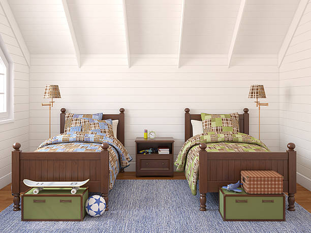 istock Children's loft bedroom with two beds and matching trunks  167231055