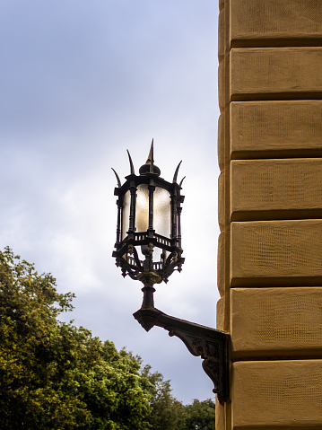 Detail of a cast iron lamp in Leghorn in Tuscany