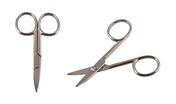 istock Open and closed silver nail scissors isolated on white (CLIPPING 167233679