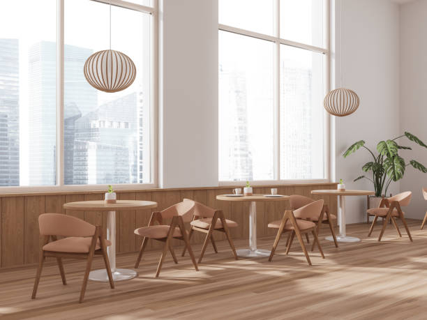 istock White and wooden cafe corner with round tables 1672345811