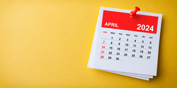 White Sticky Note With 2024 April Calendar And Red Push Pin On Yellow Background White Sticky Note With 2024 April Calendar And Red Push Pin On Yellow Background april stock pictures, royalty-free photos & images