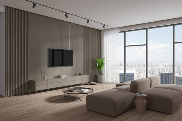 istock Beige living room corner with sofa and TV 1672350109