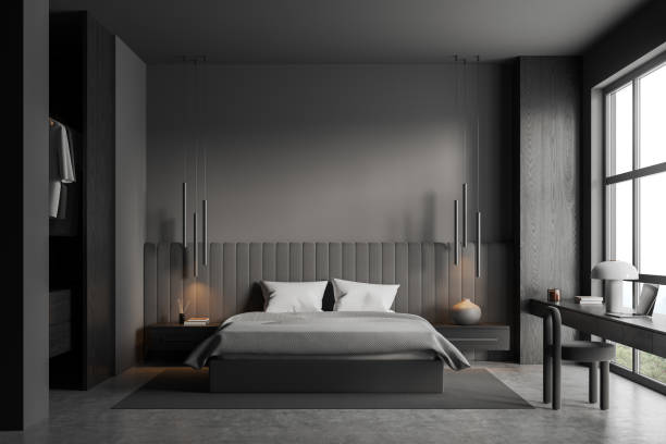 istock Grey home bedroom interior with bed, desk and panoramic window. Mockup wall 1672350643