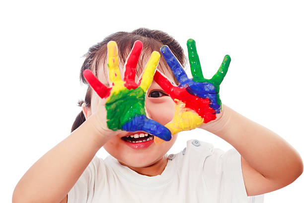 istock Curious child Looking from colorful hands 167235567