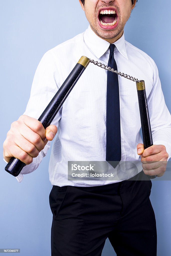 Empresário com nunchaku nunchucks - Foto de stock de Homem de negócios royalty-free