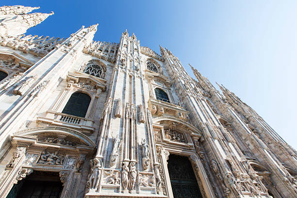 The Gothic Cathedral of Milan Duomo di Milano - The Gothic cathedral took nearly six centuries to complete. It is the fifth largest cathedral in the world and the largest in the Italian state territory.Duomo di Milano - The Gothic cathedral took nearly six centuries to complete. It is the fifth largest cathedral in the world and the largest in the Italian state territory. candoglia marble stock pictures, royalty-free photos & images