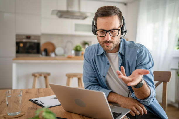 istock One man caucasian male freelancer work from home on laptop computer 1672384267