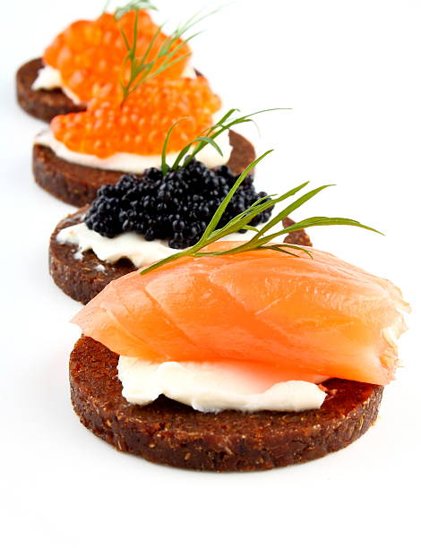 istock Black bread with salmon fish, trout and sturgeon caviar 167239659